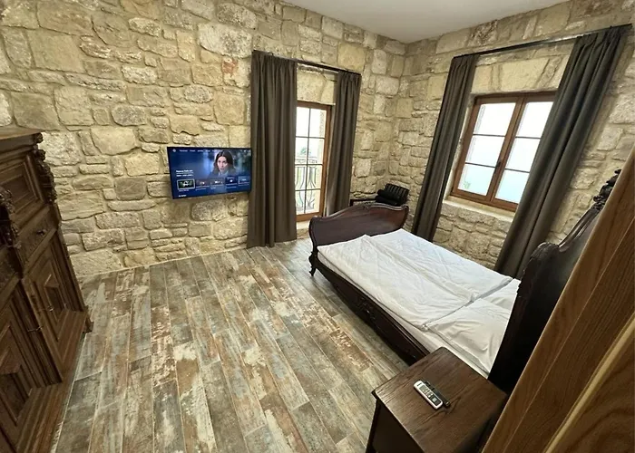 & - Terizis Le Rocher Hotel